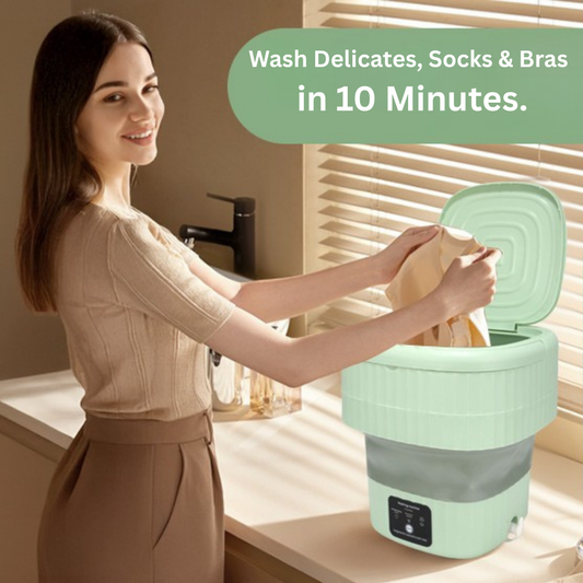A woman placing delicates into the QuickWash portable mini washing machine in a bright, clean laundry room.Portable foldable 8L mini washing machine for travel and dorms